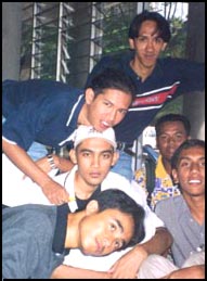 We're at the FSSR Foyer, From Top: Abg. Zamrie, Amier, Faizal (with white baseball cap), Lan, Me, and Mail (back).